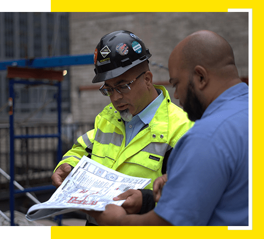 NYC Safety consultant giving guidance and advisement to construction staff