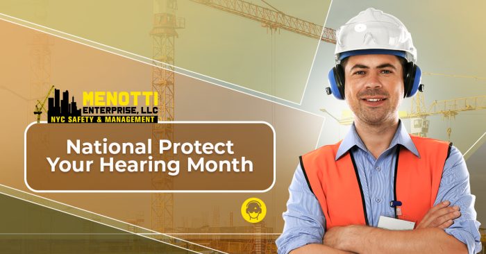 Construction worker wearing ear protection on a job site during National Protect Your Hearing Month.